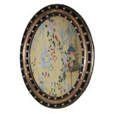 A Fine Irish Oval Mirror with Faceted "Jewels"