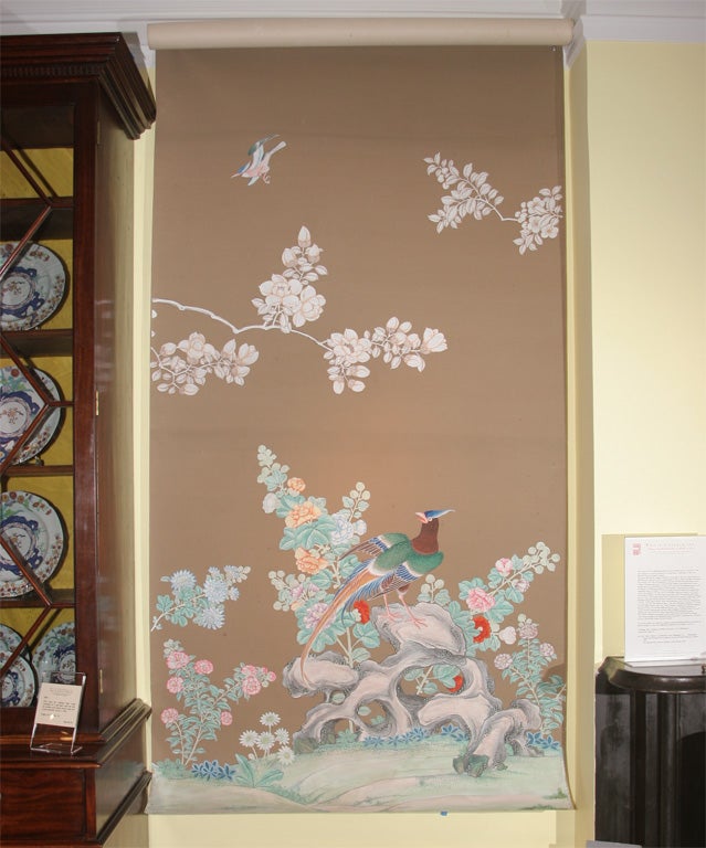 Pristine set of five antique Chinese polychrome wallpaper panels having flowering trees and low flowering branches with birds throughout on a creme de cafe background. Four consecutive panels together with a fifth panel from the same series.