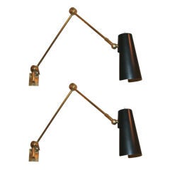 A Pair of Italian Articulated Wall Sconces signed Stilnovo