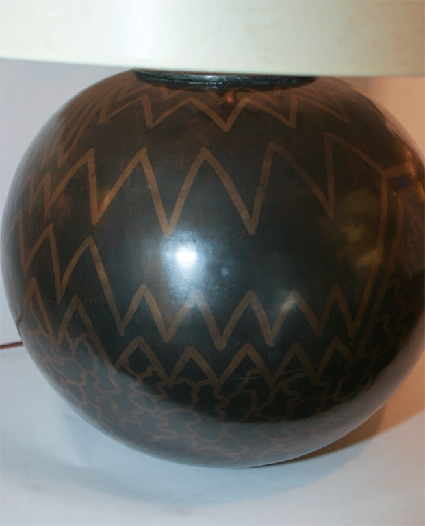 A Pair of Modernist patinated brass Spheres