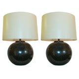 A Pair of Modernist patinated brass Spheres
