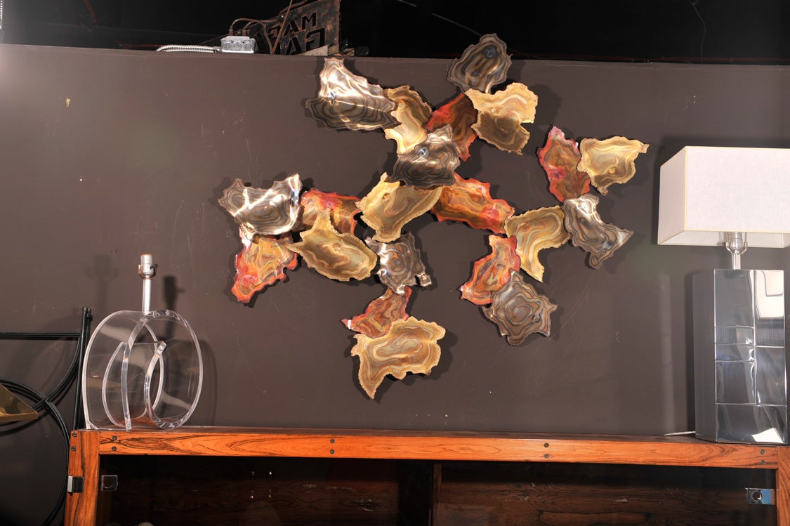 a tri-color metal abstract wall art