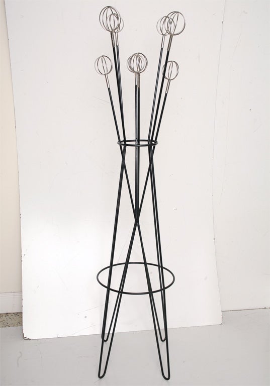 Coat rack by Roger Feraud for GEO. Black iron. Eight nickel-plated six astrolabs.
Priced individually.
Image 6:  Different hat rack by Roger Feraud, eight astrolabs $1950 each.
Priced individually.
 