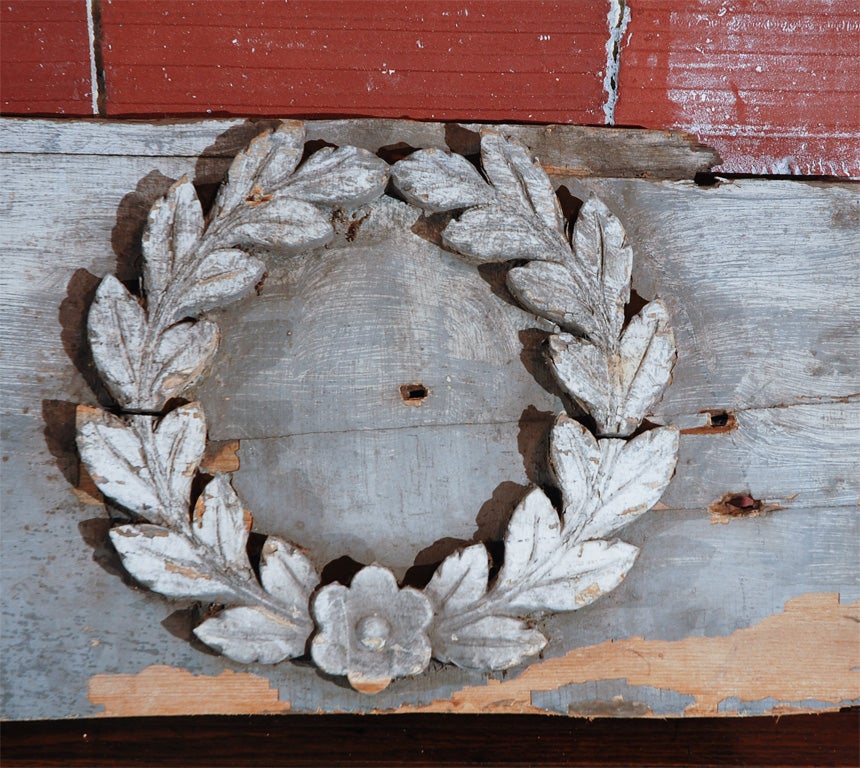 Architectural fragment from Connecticut horse barn built, circa 1870. Wonderfully carved acanthus wreaths. Superb dry paint surface.