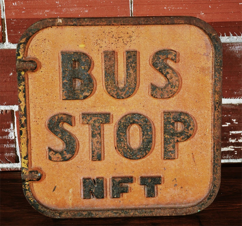 Very graphic American heavy cast iron bus stop sign.  Double sided with superb paint surface.
