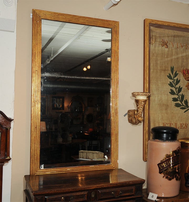 Large Scale French Fluted Giltwood Mirror