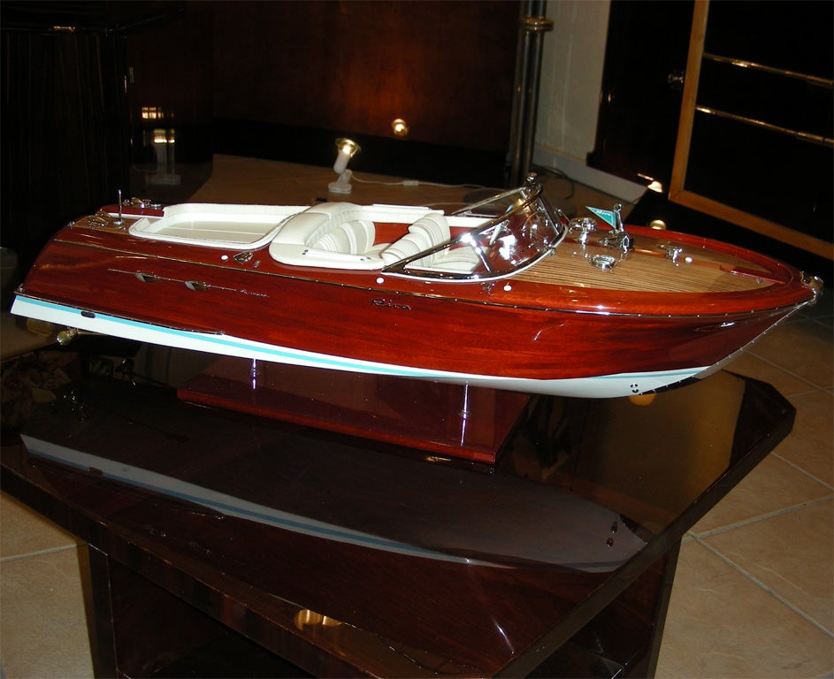 Contemporary model boat reproduction of a 1972 AcquaRiva in mahogany, chromed metal and leather. Very high quality hand-made craftsmanship.
