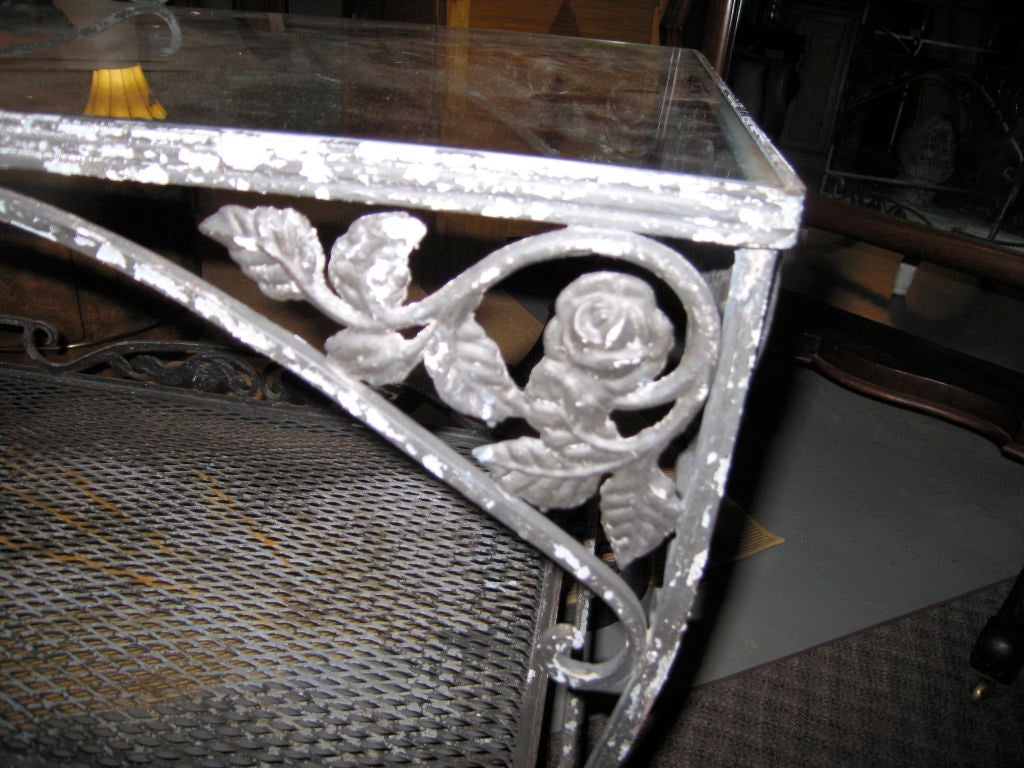 floral relief with glass top