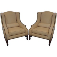 Pair of Wing Back Club Chairs with Bolster
