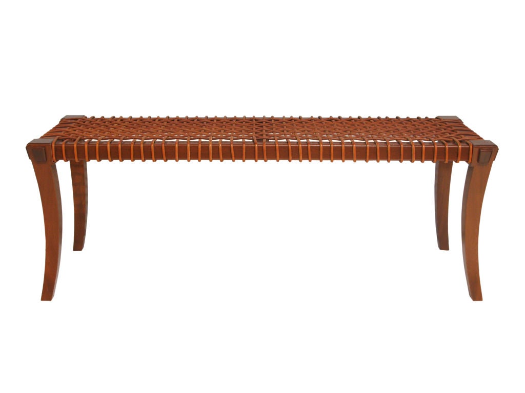 Bench in walnut with leather straps in the manner of Robsjohn-Gibbings for Sarides