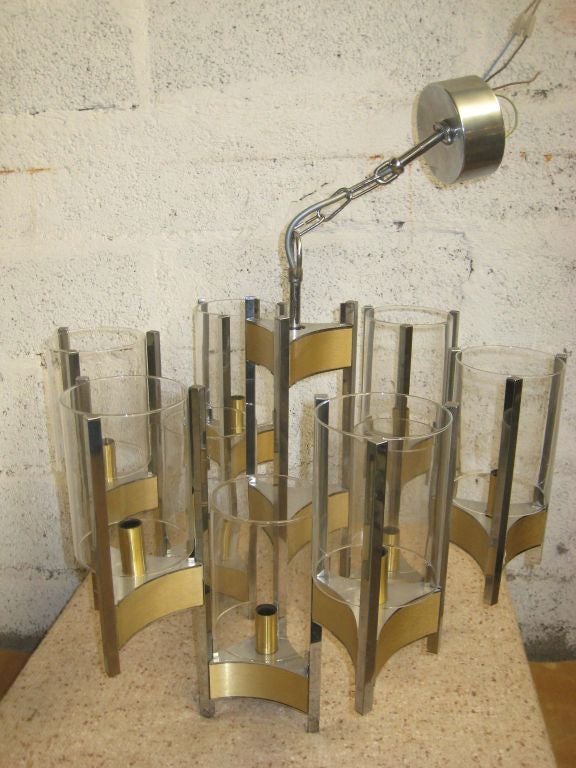 Sciolari chandelier of brass, chrome and glass. Original label.
Located in NY.
