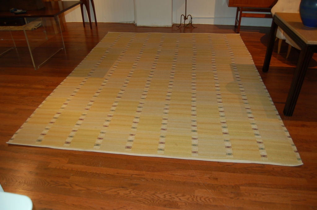 Beautiful hand-woven flat-weave carpet “Falurutan Gul” (“Yellow Squares”), designed by Barbro Nilsson for Märta Måås-Fjetterström in Sweden, ca. 1955