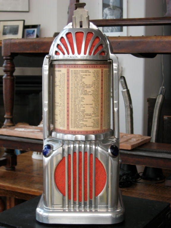 Extremely cool early juke box that lights up as table lamp.