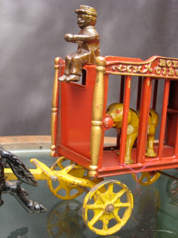 Wonderful Royal Circus cast iron toy with caged lion.