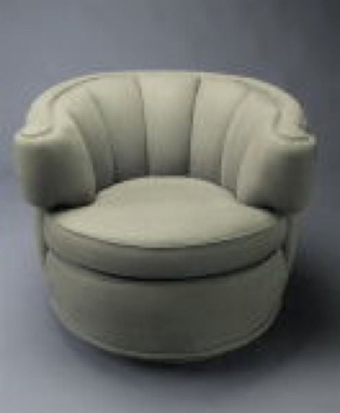 PAIR OF AMERICAN 1940'S SWIVEL LOUNGE CHAIRS  manner James Mont