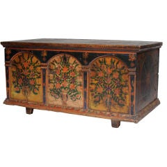 A ROMANTIC TYROLEAN POLYCHROMED FLORAL PAINTED PINE LARGE CHEST