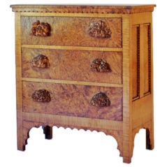 A SCANDINAVIAN BURL-WOOD AND FIDDLE-GRAINED  CHEST OF DRAWERS