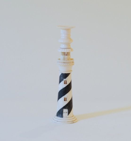 A SET OF FOUR ANGLO-INDIAN CARVED BONE LIGHTHOUSE CANDLESTICKS