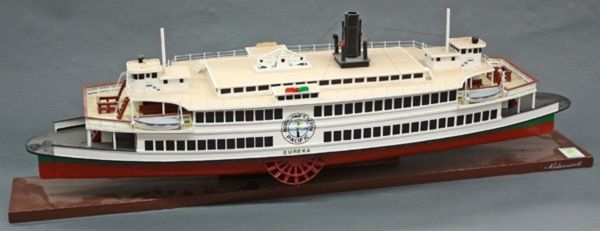 A fine hand-made wooden hulled model of the famous paddle steamer 'Eureka'.  Built and signed by the master model builder, Vaclav Niedermertl.