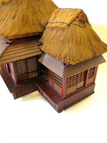 THE TWO ROOF PORTIONS OPEN TO REVEAL A WELL-DETAILED INTERIOR; FITTED WITH REMOVABLE SHOJI SLIDING DOORS; THE EXTERIOR SIMILARLY CRAFTED; ORIGINAL LIGHTING NOW NON-OPERATIVE.