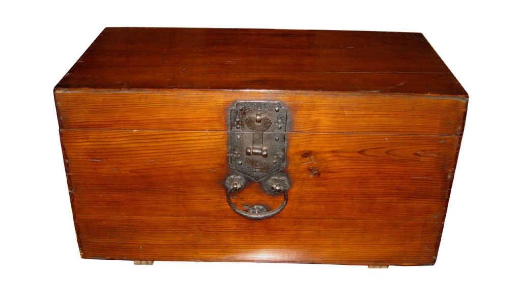 Antique Korean wedding chest made with pine wood during the Chosun dynasty, 19th century.  The bride would store gifts to bring to the groom's house in this chest.  The iron metal lock and handles are original.