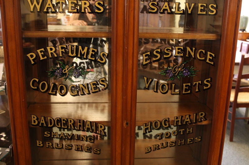 antique perfume cabinet