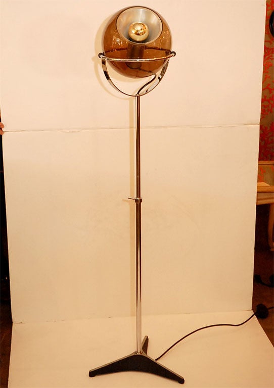 Pair of Raak Floor Lamps. Smoked Glass, Chrome and Iron.<br />
54