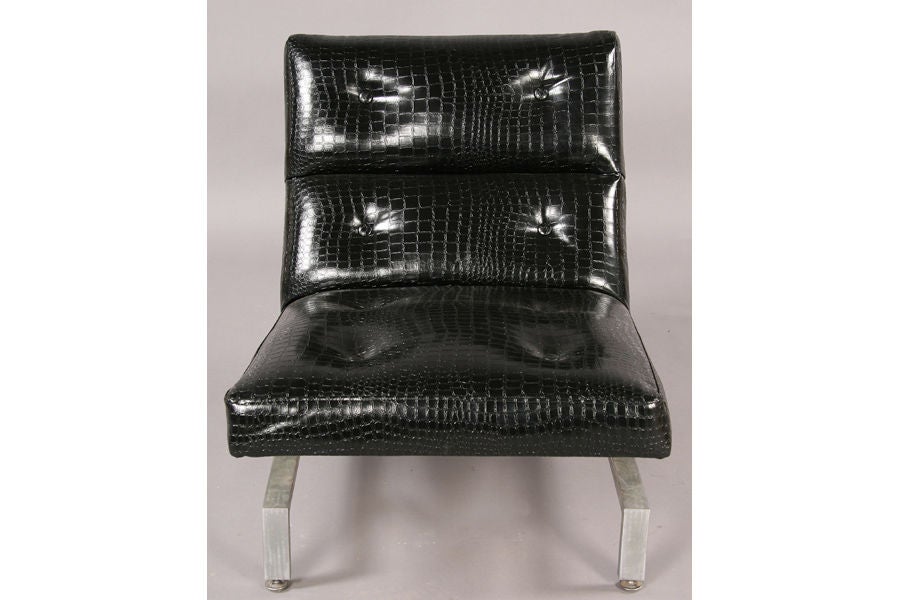 Pair of Italian Mid-Century Modern lounge / slipper chairs with seats upholstered in faux alligator. The sober nickel metal bases elegantly cantilever the seats. 

Seat height is approximately 16".