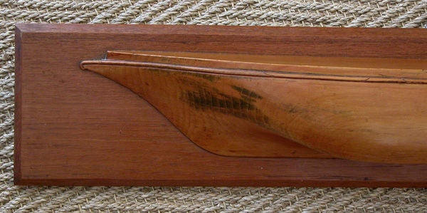 A Streamlined American Carved Spruce Half-Hull Builder's Model