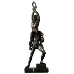 A Spirited German Art Deco Hematite-Iron Figure of Two Athletes