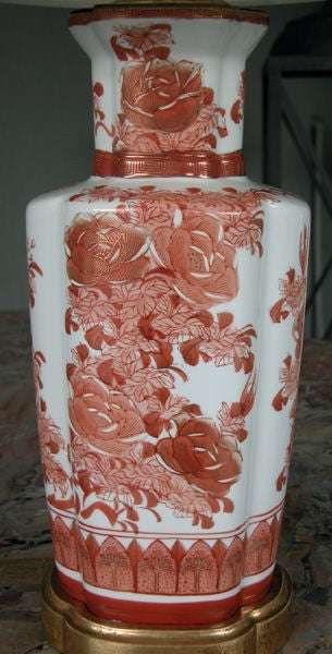 An Elegant Pair of Chinese Export Iron-Red Glazed Lobed Urns