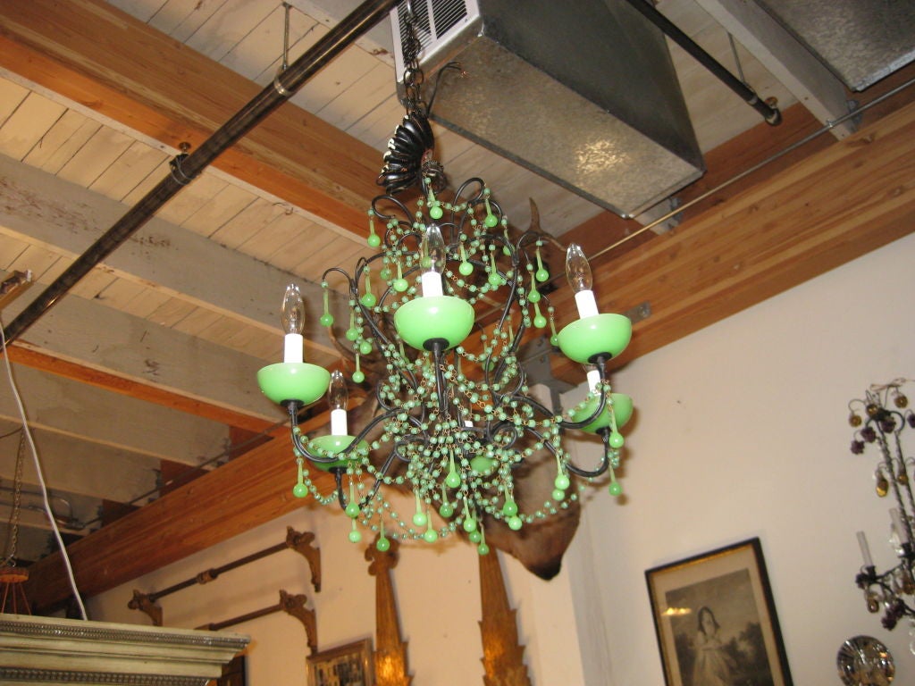Great looking little green glass chandelier