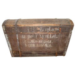 Antique Domed Trunk  With Iron Straps and Worn Wood