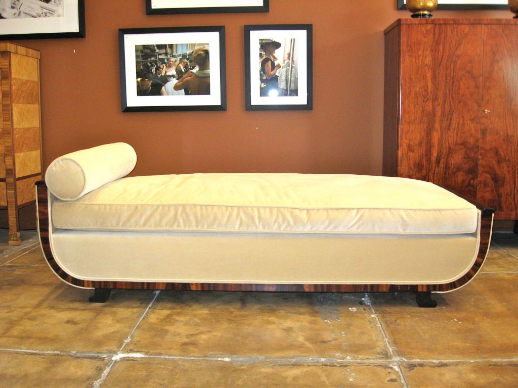 Swedish Art Deco day bed in rosewood and ebonized birch wood ca. 1920. This piece has been completely restored. It is reupholstered in taupe velvet. Mattress is composed of wrapped down.