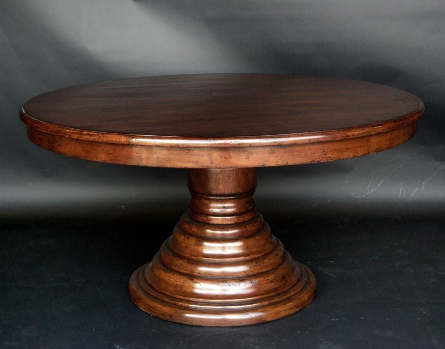 Beehive pedestal table in light Mahogany with heavy distress