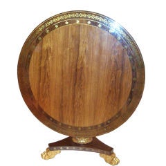 A Regency Rosewood and Brass-Inlaid Tilt-Top Table