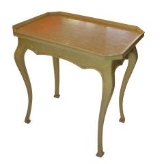 A pair whimsical yellow lacquered tables