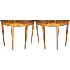 An exquisite pair of demilune zebrawood consoles