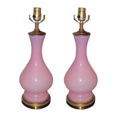 A pair of light pink opaline glass lamps