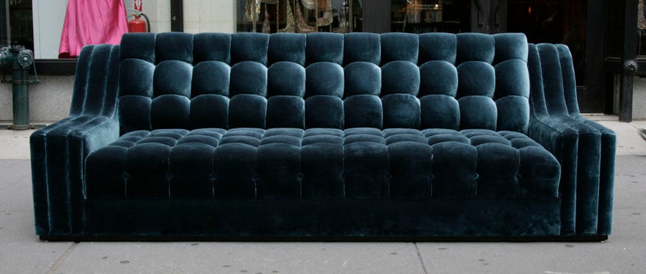 An elegant, generously proportioned sofa designed by James Mont.