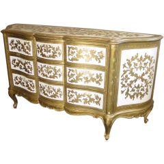 A Venetian Rococo Style Gilt and White Painted Commode