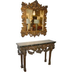 A Baroque Style Giltwood Mirror and Console