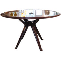 A Round Dining Table By Osvaldo Borsani