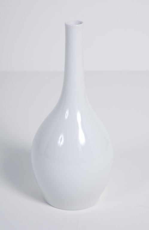 An elegant, petite flower bud vase in porcelain with glazed manufacturer’s mark on the bottom, by Marguerite Wildenhain for KPM. German, circa 1930.