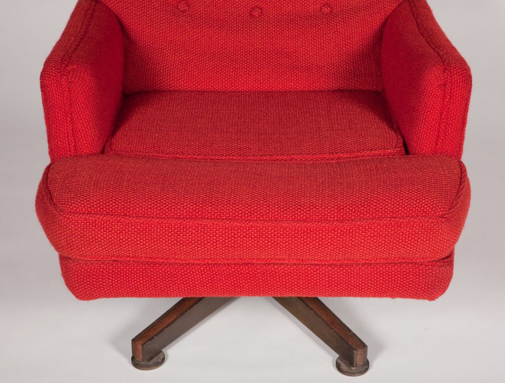 red lounge chair with ottoman