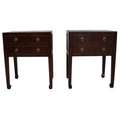 A Pair Of End Tables With Three Drawers