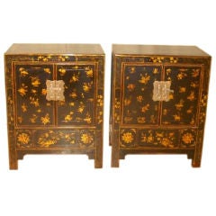 A Pair Of Black Lacquer Chests With Gold Gilt Motif
