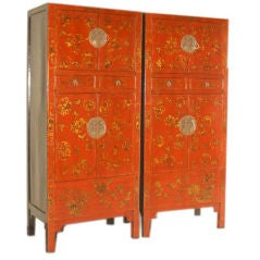 A Pair of Red Lacquer Armoires With Gold Gilt Floral Motif