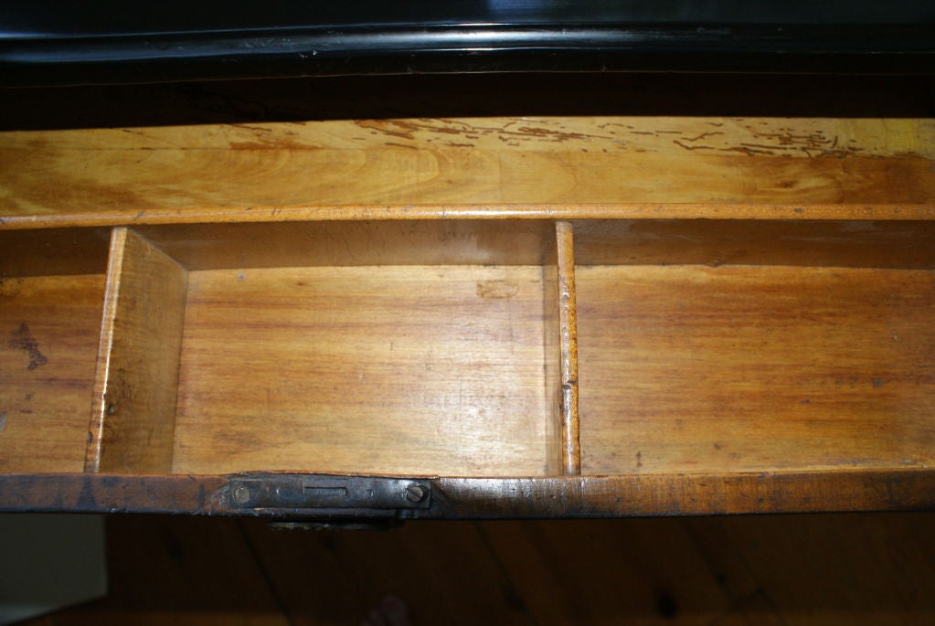 Elegant one drawer Walnut Burl desk with harp shaped legs. Ebonized bottom stretch and ebony top. Original decorative brass hardware. Wonderful detail in the walnut burl wood, fine craftsmanship.