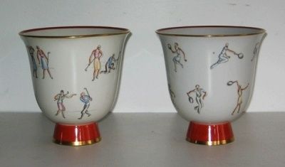 Flaring and footed sport themed porcelain vases designed by <br />
Gio Ponti for Richard Ginori,eached fully marked see photo's.